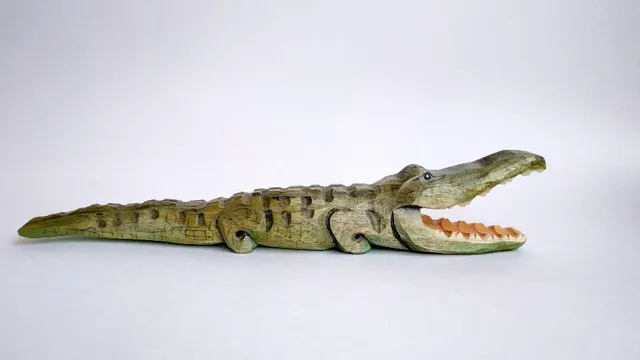 Wooden toys.Safari animals, Africa. Crocodile.