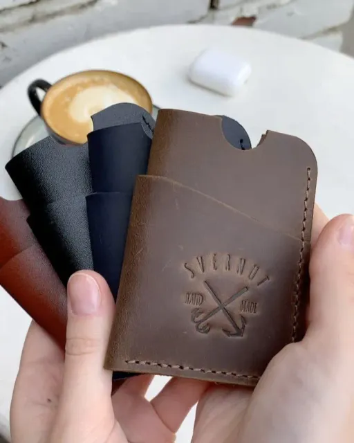 Genuine Leather Cardholder Wallet.  It has 2 credit card slots which can hold 4-5 cards. Also could be used for banknotes.