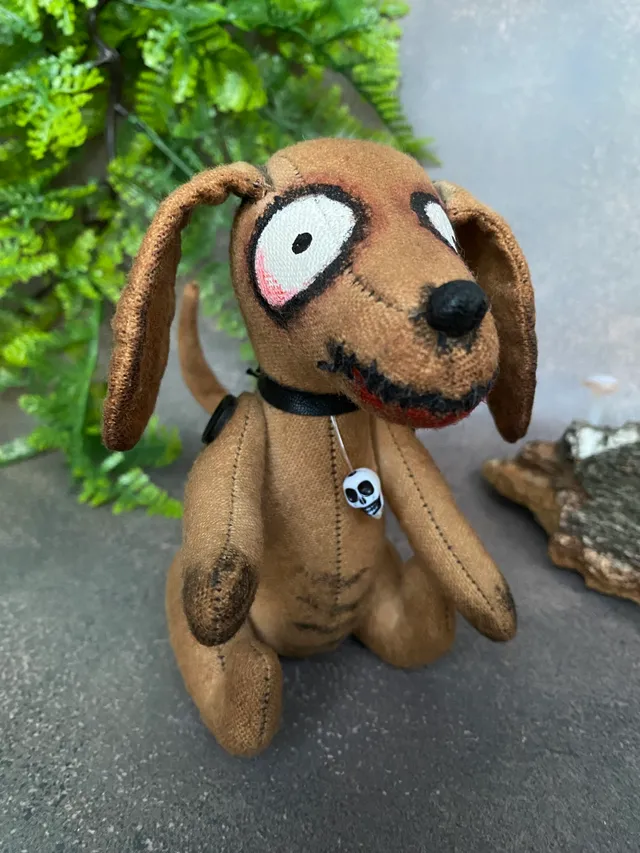 Creepy cute dog . Zombie doll .