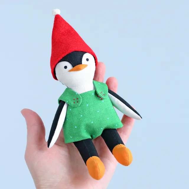 This penguin looks very Christmassy when wearing a red hat and a green romper, but without such an outfit, it loses its Christmas vibe and becomes an all-season toy, which is great because it can be played with all year round! Sew this cute softie yourself with my easy to follow sewing pattern!