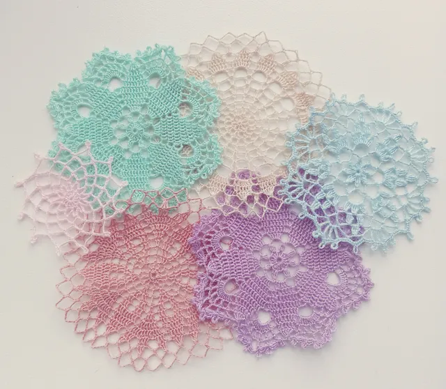 Hello my precious friends! My shop will be loaded with piles of crochet throws, blankets, tablecloths, doilies, potholders and Christmas stockings very soon. Today I'd like to share with you a picture of my new doilies in pastel shades. Their size is 4 - 6 cm (1,6 - 2,4 inches) in diameter. Hope they will be a perfect addition to your lovely dollhouses!