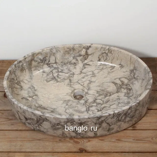 .
🔰Природный мрамор обладает массой достоинств, позволяющих использовать его в разных областях жизни. Однако наиболее удачно он применяется для изготовления элитного сантехнического оборудования, в том числе раковин из мрамора.
.
Размеры (ШxГxВ)	60х40х14 см
.
.
#banglo#раковиныbanglo#раковинаизокаменелогодерева#раковиныизкамня #раковиныизнатуральногокамня #раковинаизоникса #раковинаизмрамора #работаскамнем#дизайнерскаяпродукция #декорванной #ваннаякомната #аксессуарыизкамня #раковинадляванной#элитнаясантехника#лофт #лофтдизайн #лофтинтерьер #ваннаякомнатадизайн #дизайнподключ#мрамор#раковина #раковинынастолешницу #раковиныдляванной #раковинымосква #раковиныспб