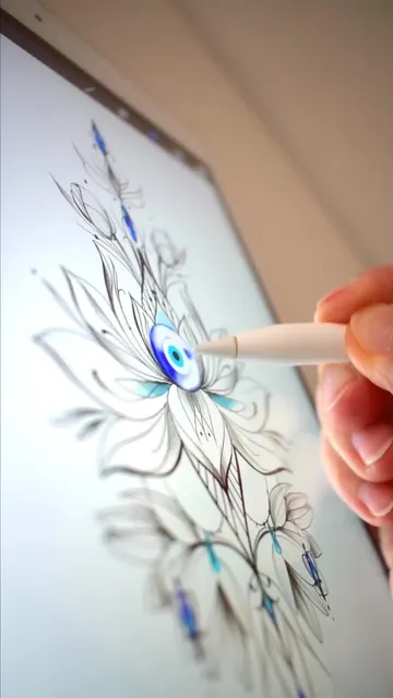 Tattoo design evil eye and lotus