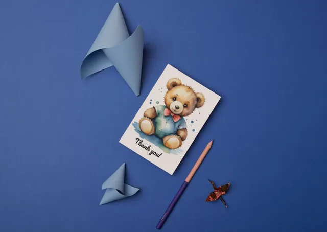 Postcards with a watercolor image of a cute teddy bear in a blouse and a bow around his neck