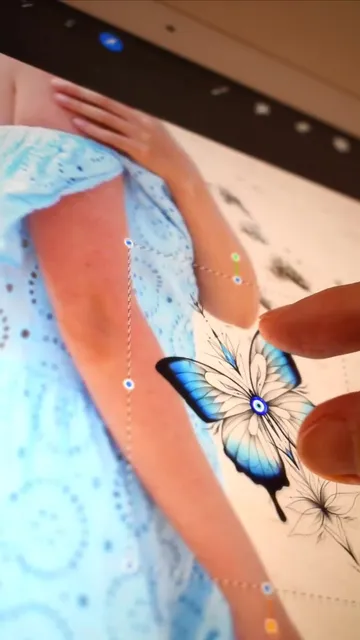 Butterfly and evil eye tattoo design idea