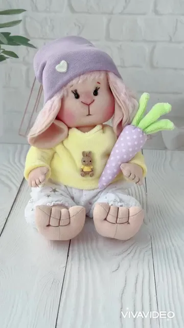Lovey bunny toy. Handmade cute stuffed rabbit with clothes and carrot. Soft rag bunny doll for Easter gift.