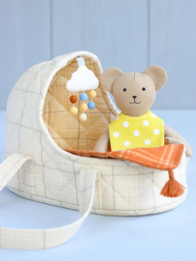 Tiny bear for hours of fun! And you can sew it yourself! Dress it up, feed it, put it to bed, or take for a walk — it fits perfectly in a pocket! You can sew this mini bear and a large set of accessories, including a carrycot, using my sewing pattern. The sewing pattern includes clear step-by-step photo instructions and full-size pattern pieces, it's easy to follow and beginner friendly, with lots of sewing tips and tricks.