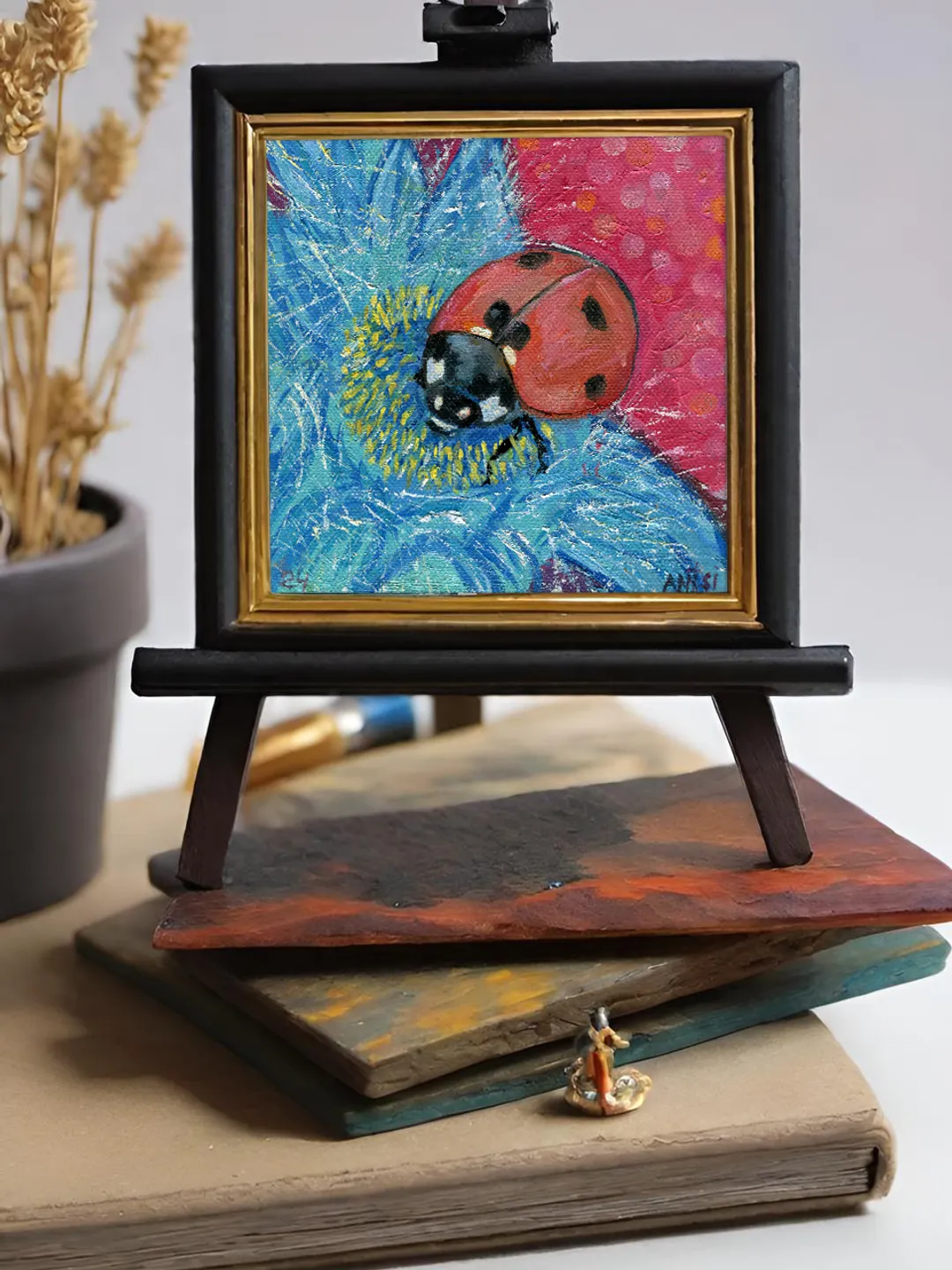 Painting flowers with a Ladybug