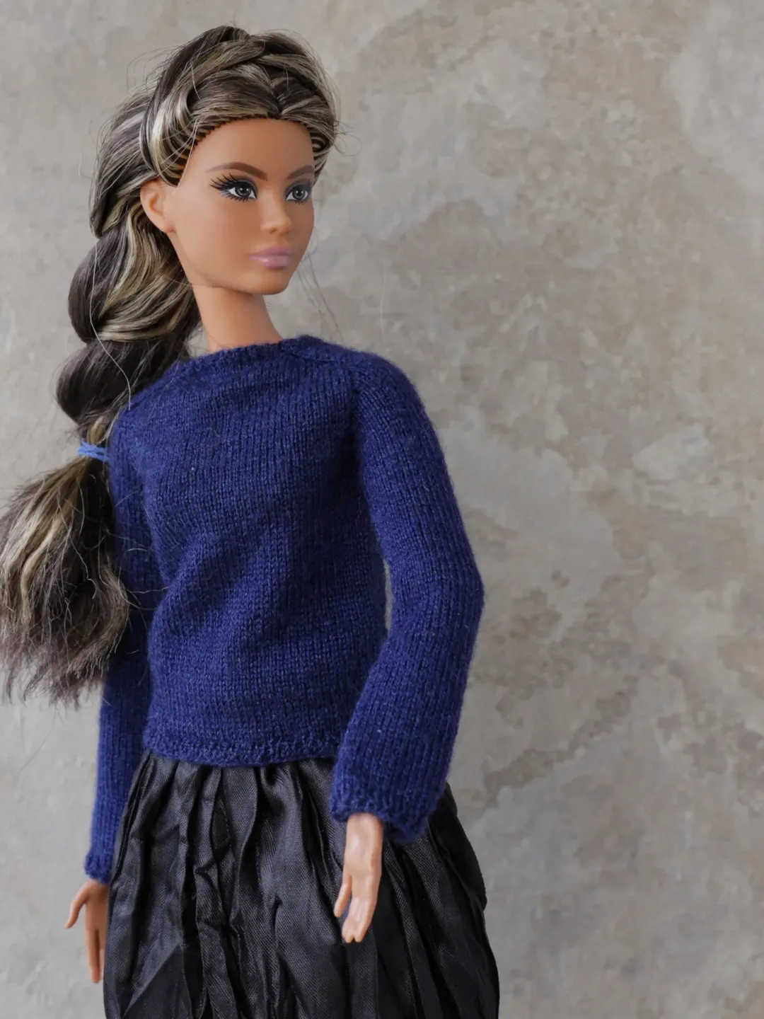 Knitted dark blue sweater for Barbie dolls. Clothes for a Barbie doll.