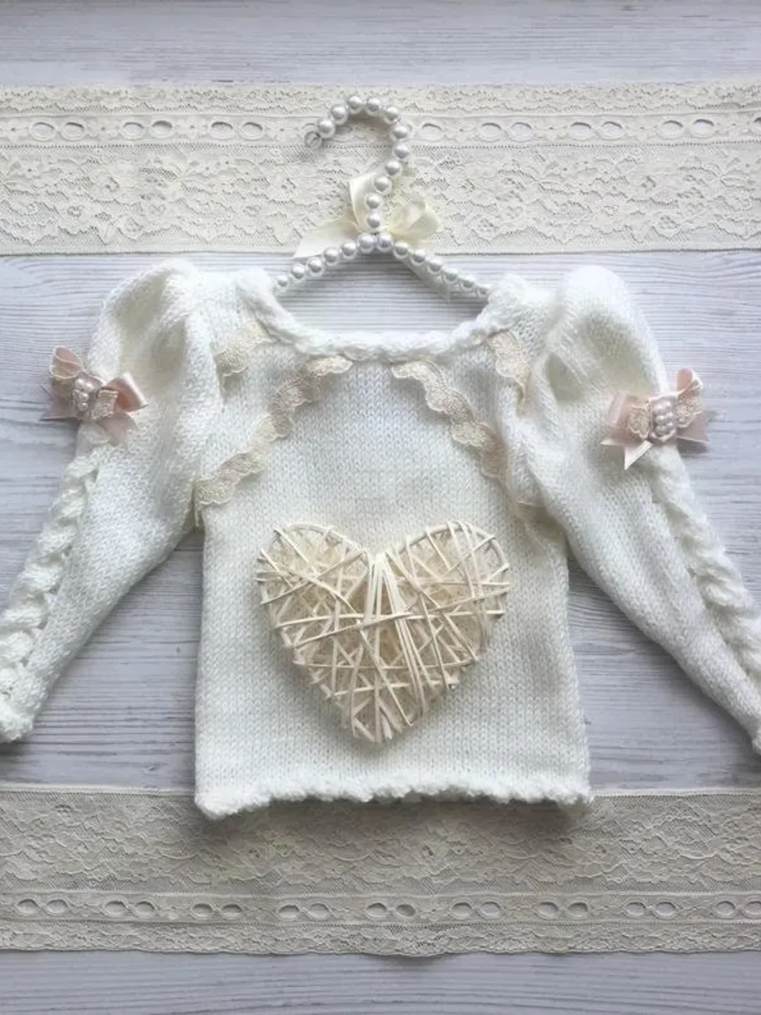 Knit sweater for baby girl. Ivory sweater with lace, pearls and bows. Cutout back sweater for baby girl.