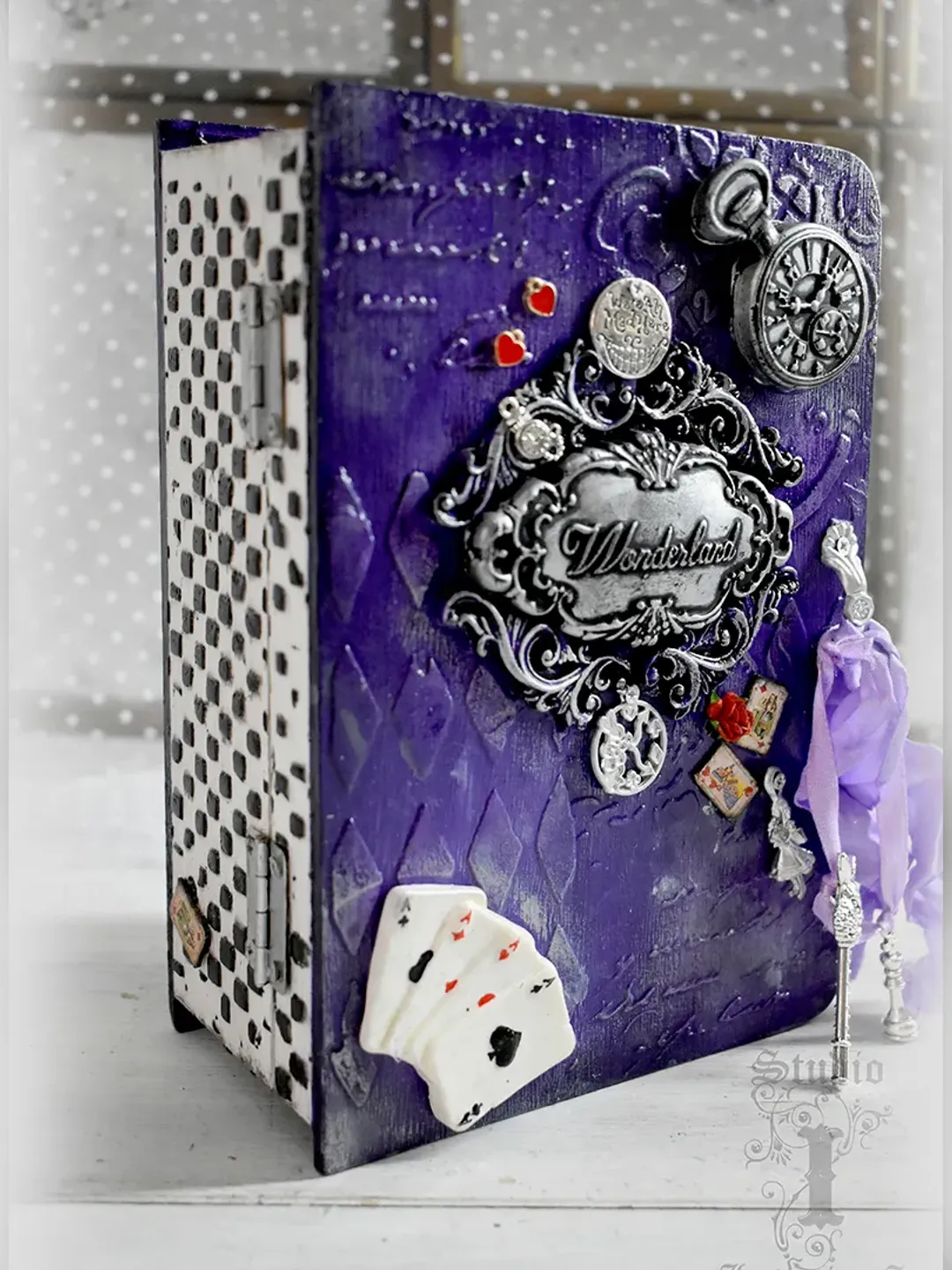A lilac box-book with for cards or jewelry for storage for Alice fans