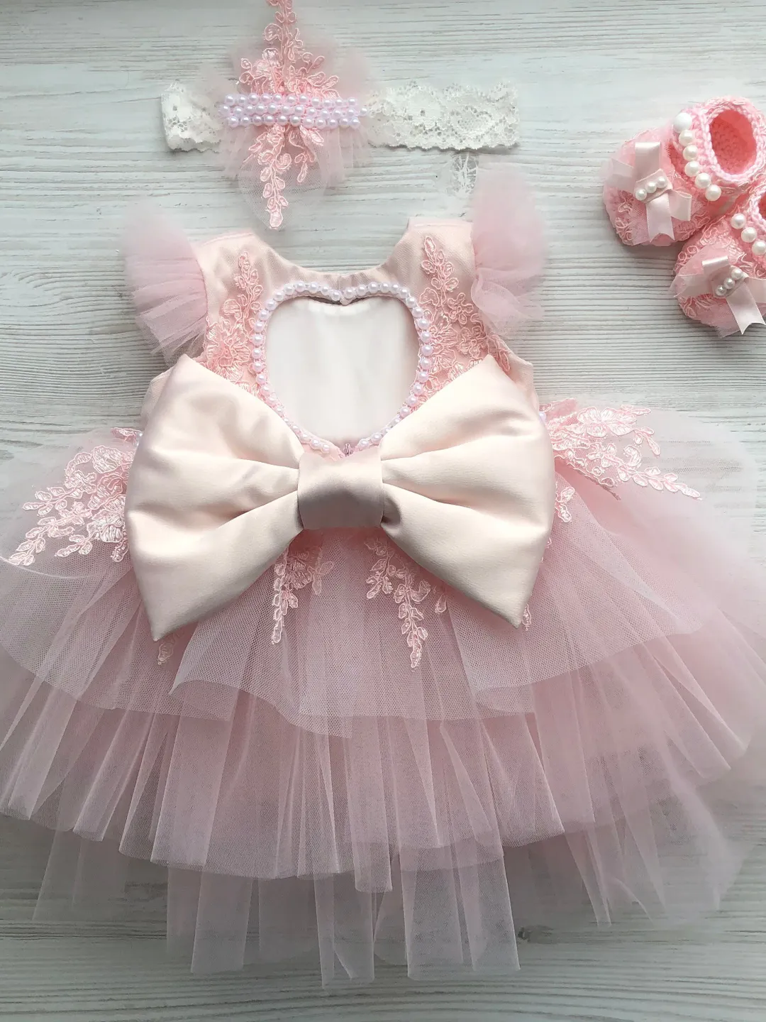 Light pink Dress with headband, panties and booties for baby girl. Dress with lace and pearls. First birthday outfit for girl. Light pink Dress with headband, panties and booties for baby girl. Dress with lace and pearls. First birthday outfit for girl.