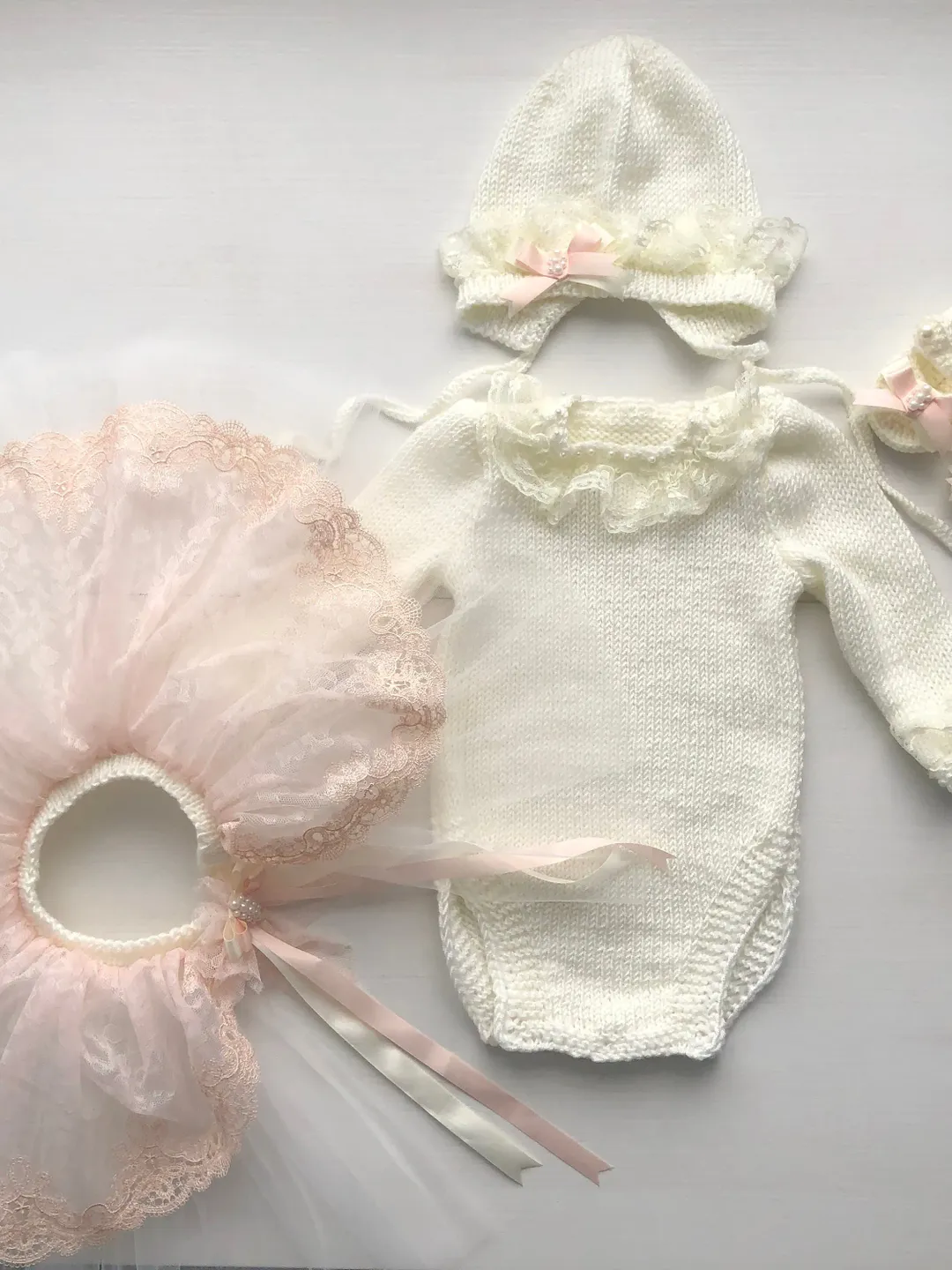 Knit ivory romper with lace and pearls, tutu with blush peach lace and ivory tulle, hat and shoes for baby girl.