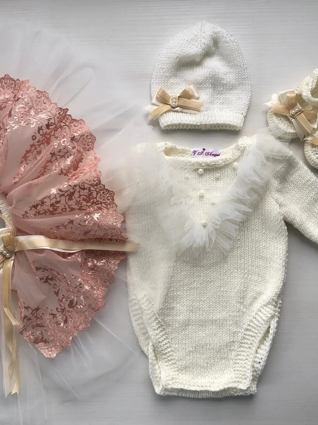 Knit romper with tule and pearls, hat, booties and tutu with lace. Take home outfit for baby girl. First birthday outfit. Photo props