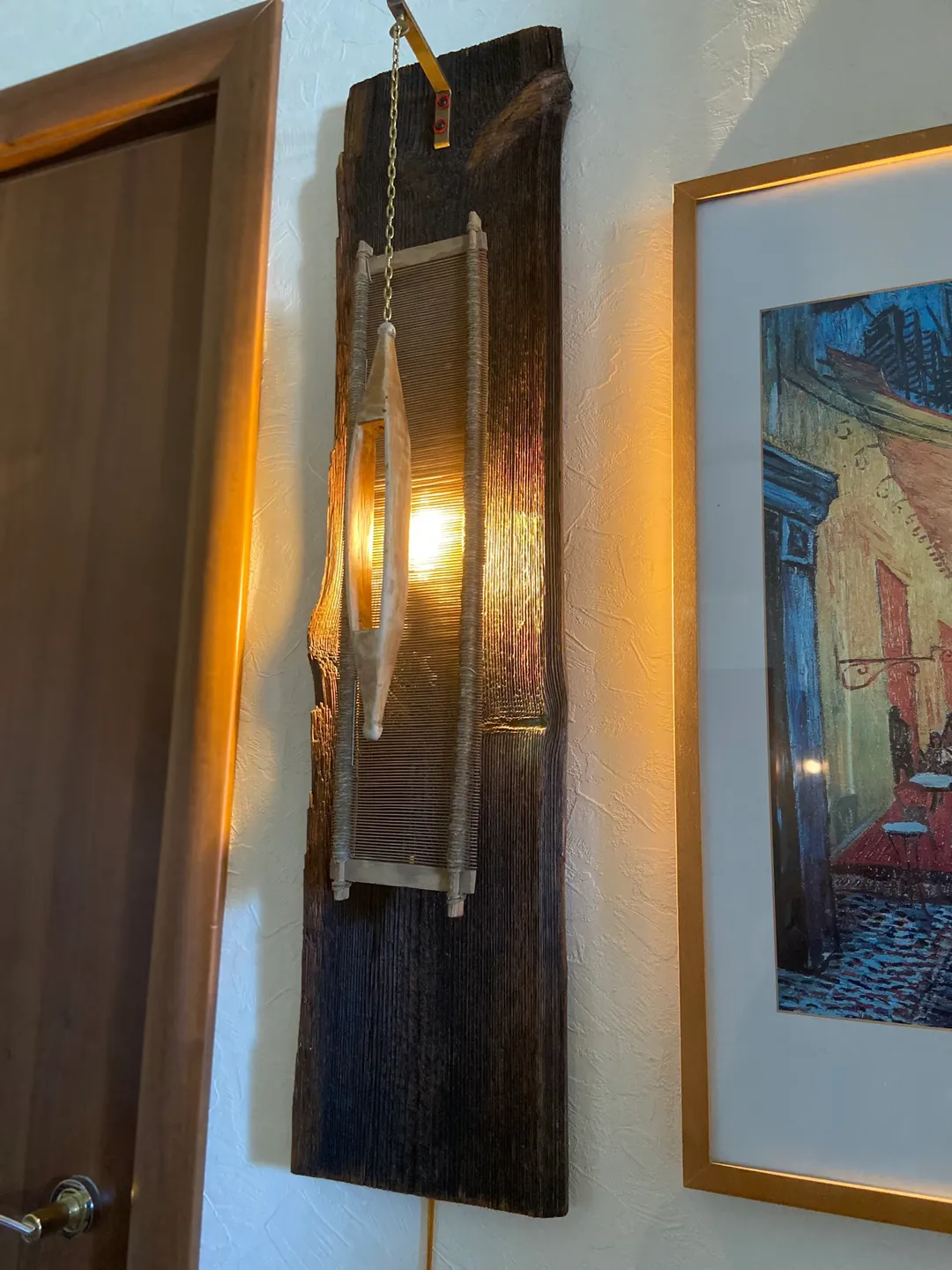 Wall sconce of antique loom