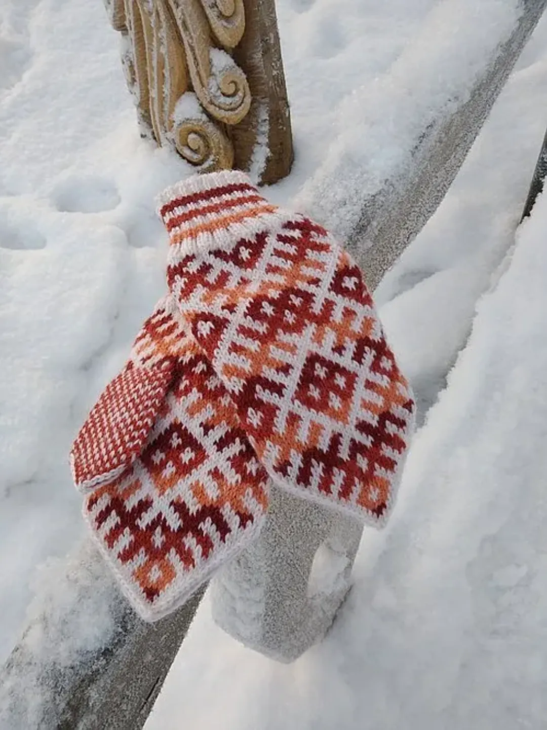 Women's hand-knitted wool mittens are very warm with a pattern