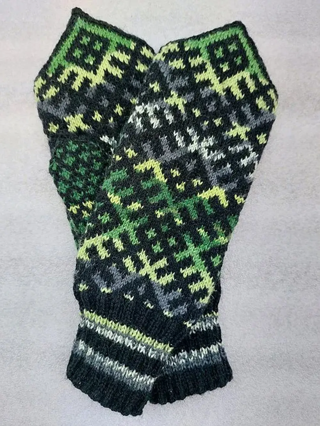 Women's hand-knitted wool mittens are very warm with a pattern