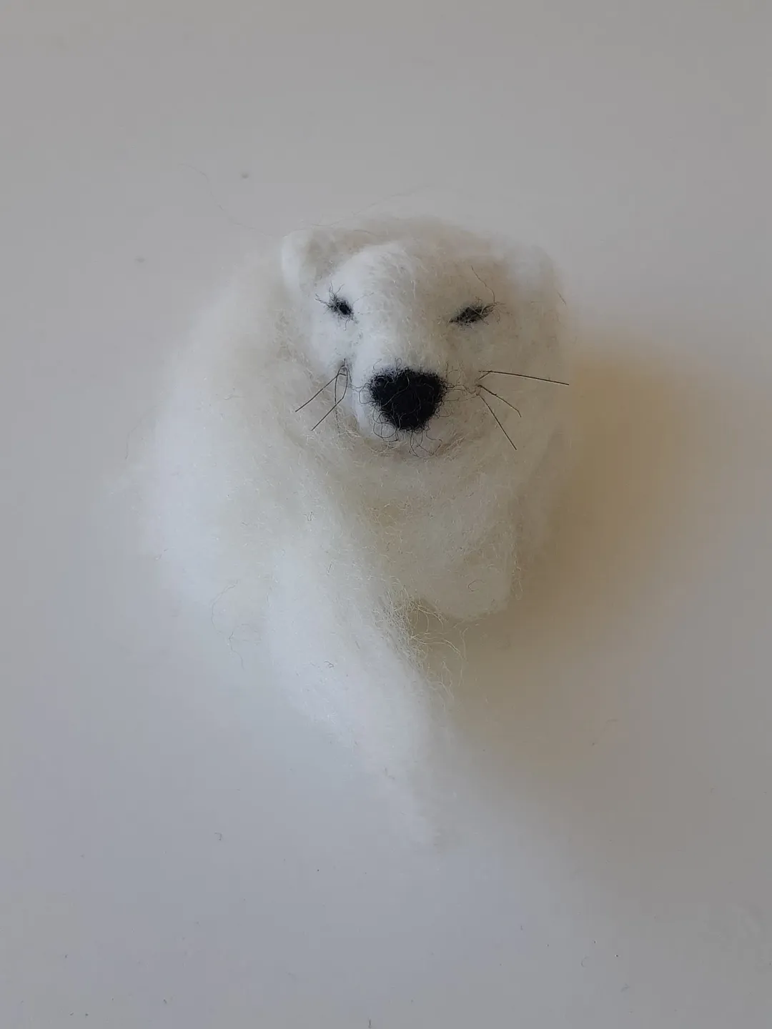A felted fox of merino wool, south american, handmade