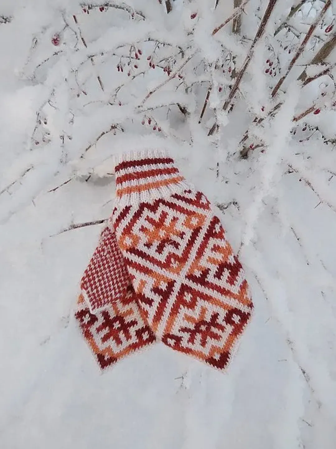 Women's hand-knitted wool mittens are very warm with a pattern
