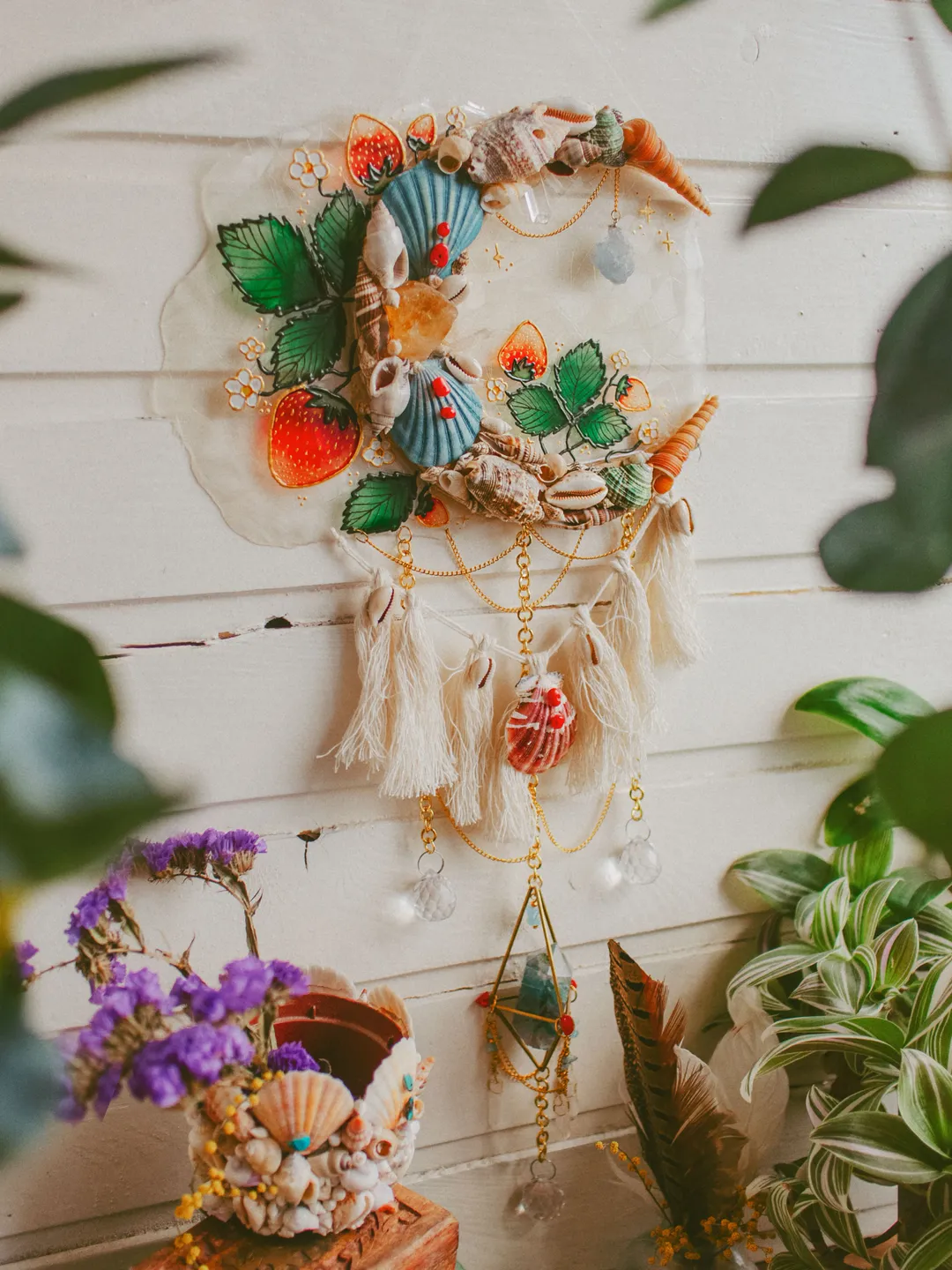 Mermaid Suncatcher “Strawberry Fields Forever“ made with shells, crystals and light refracting elements. Bohemian moon wall hanging with stained glass effect. Maximalist hippie home decor.