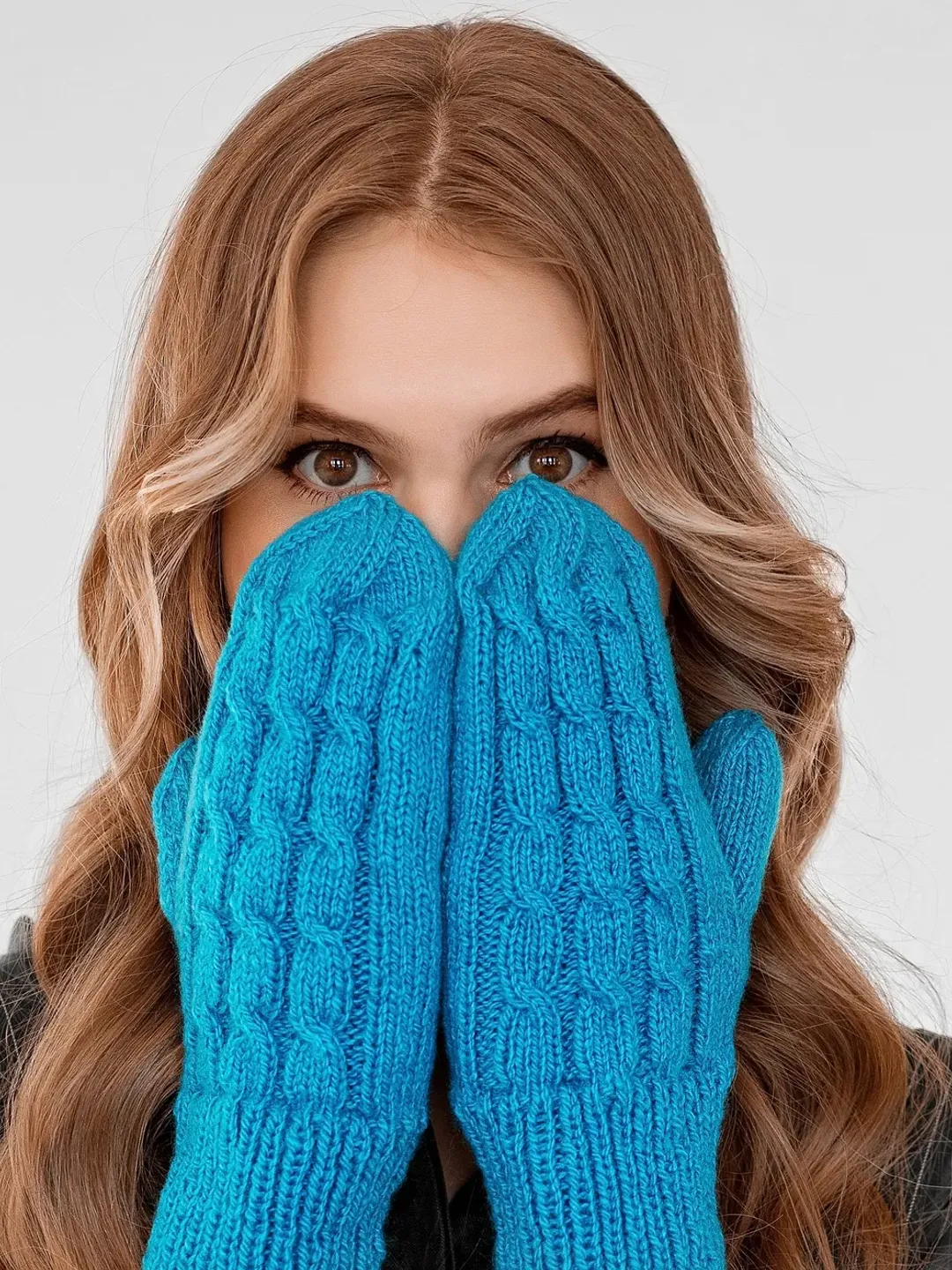 Hand knitted blue mittens. Handmade.