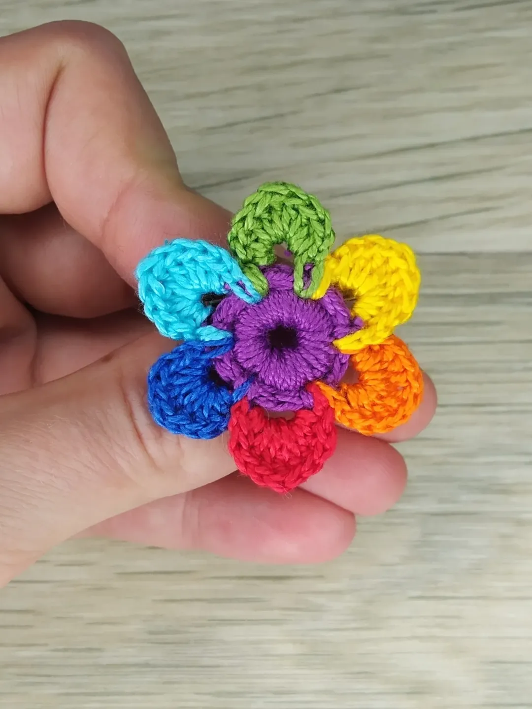 Rainbow flower brooch for women. Crochet small flower pin. LGBTQ flower brooch. Amiguruni floral brooch colorfull.