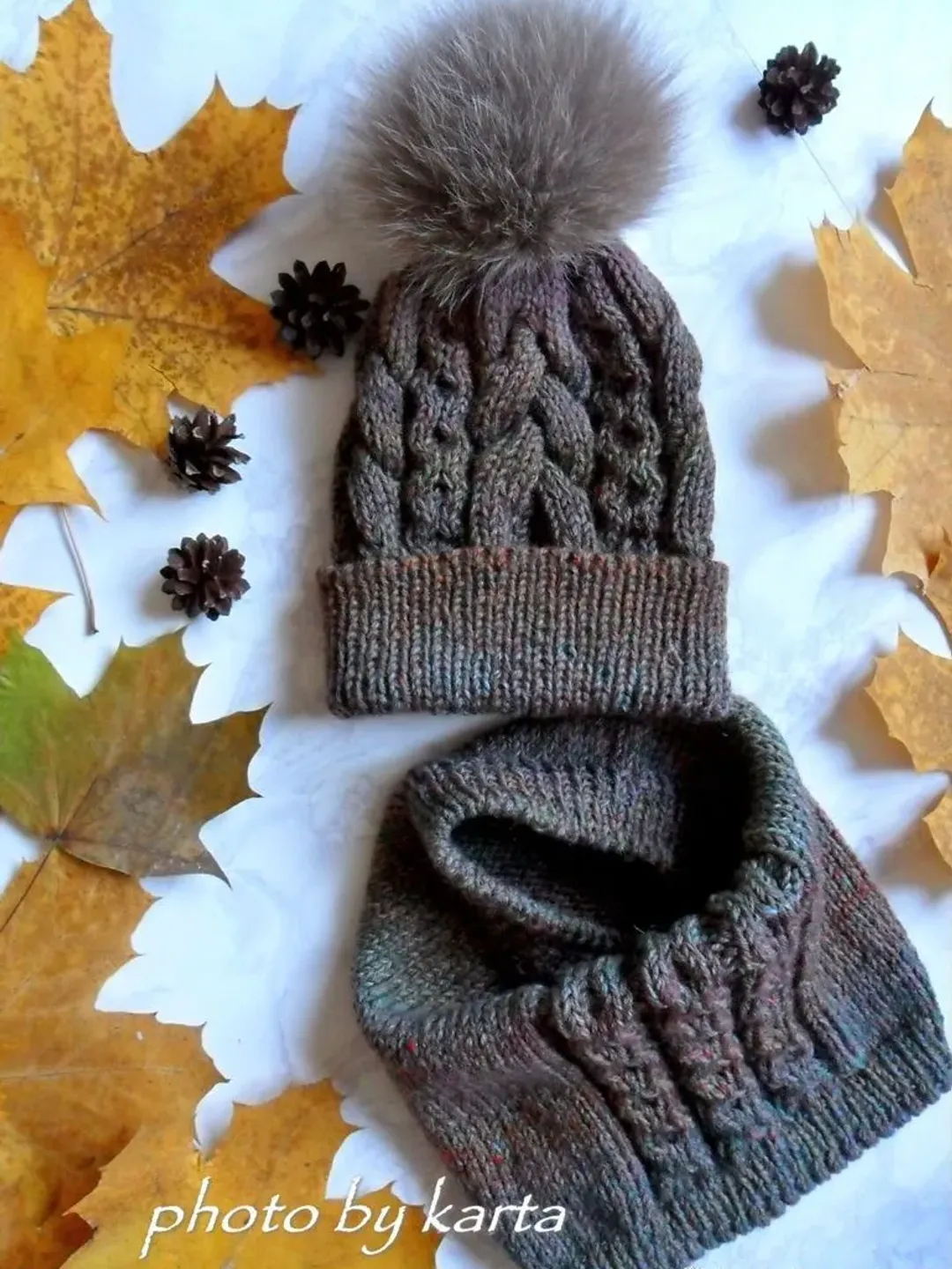 Set of knitted accessories hat with fur pompom and snood