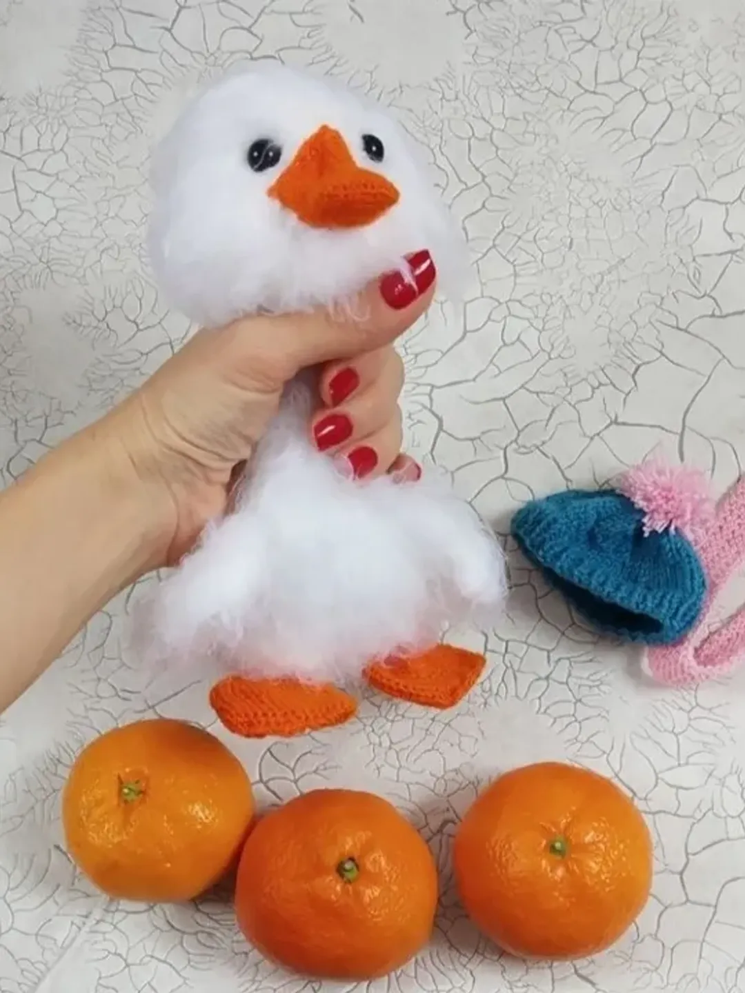 White stuffed duckling with bendable feet, plush fluffy goose, stuffed toy fluffy duckling