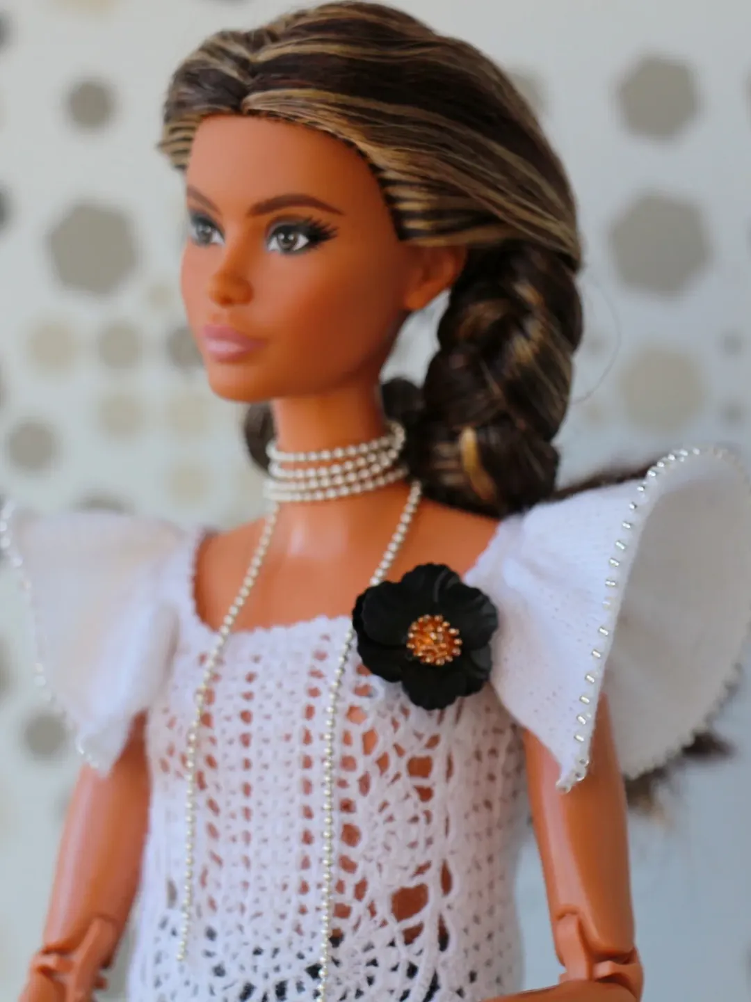 White openwork crocheted top and black silk skirt for Barbie doll. Unique clothes for Barbie. Handmade clothes to doll