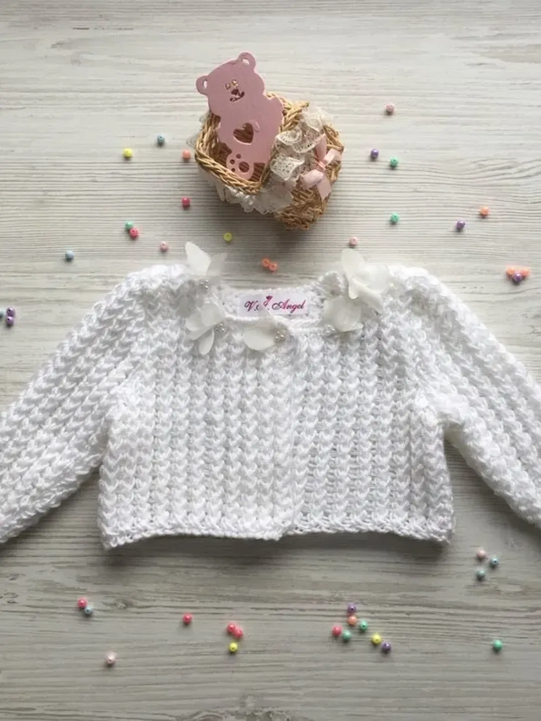 Knit jacket for baby girl. White knit jacket with 3d flowers for baby girl.