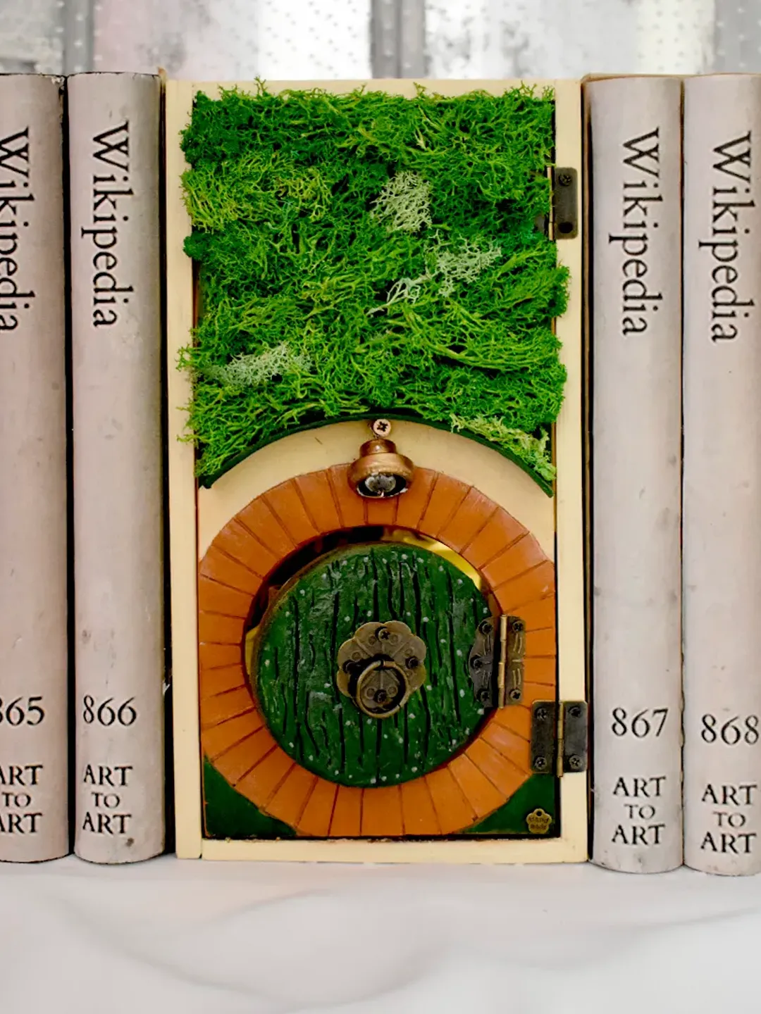 Book nook on the bookshelf on BILBO BAGGINS' HOUSE, miniature home on a bookshelf