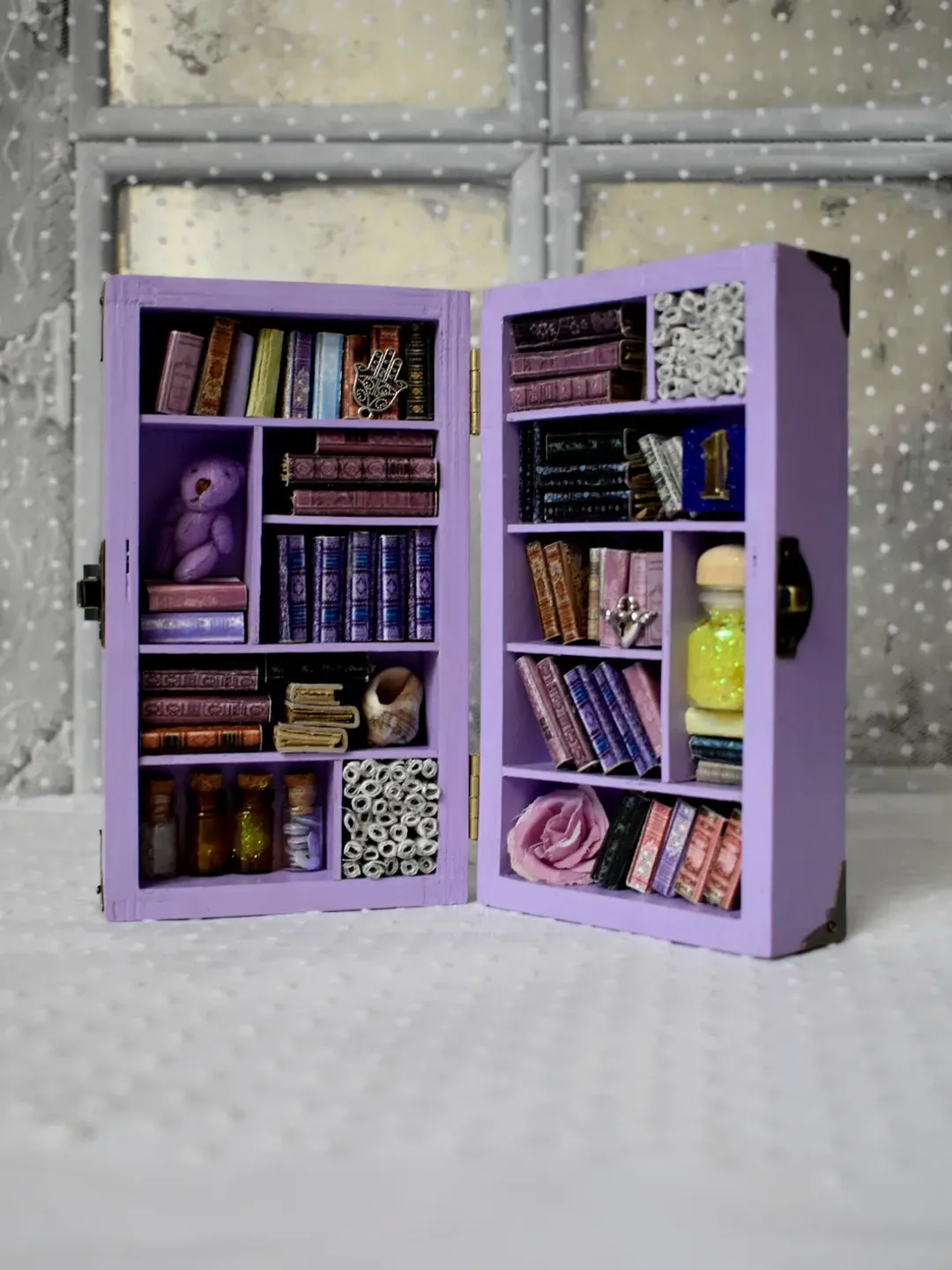 A miniature library with minibooks the bookshelves in the living room