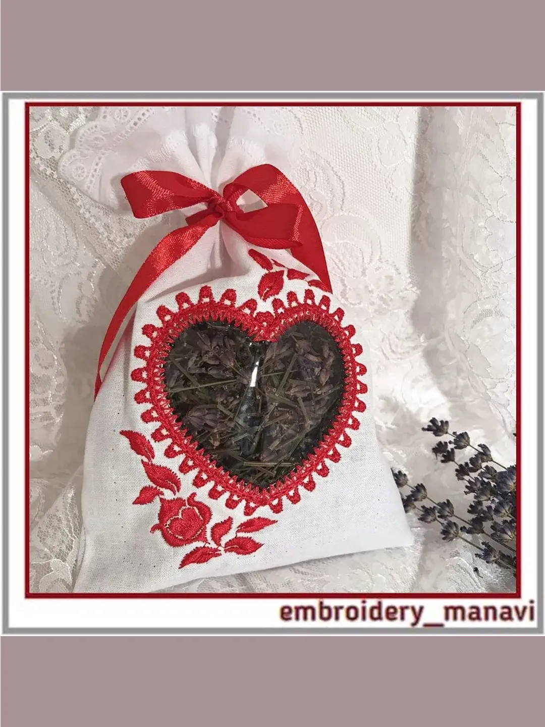 Embroidery design of a heart-shaped window with flowers