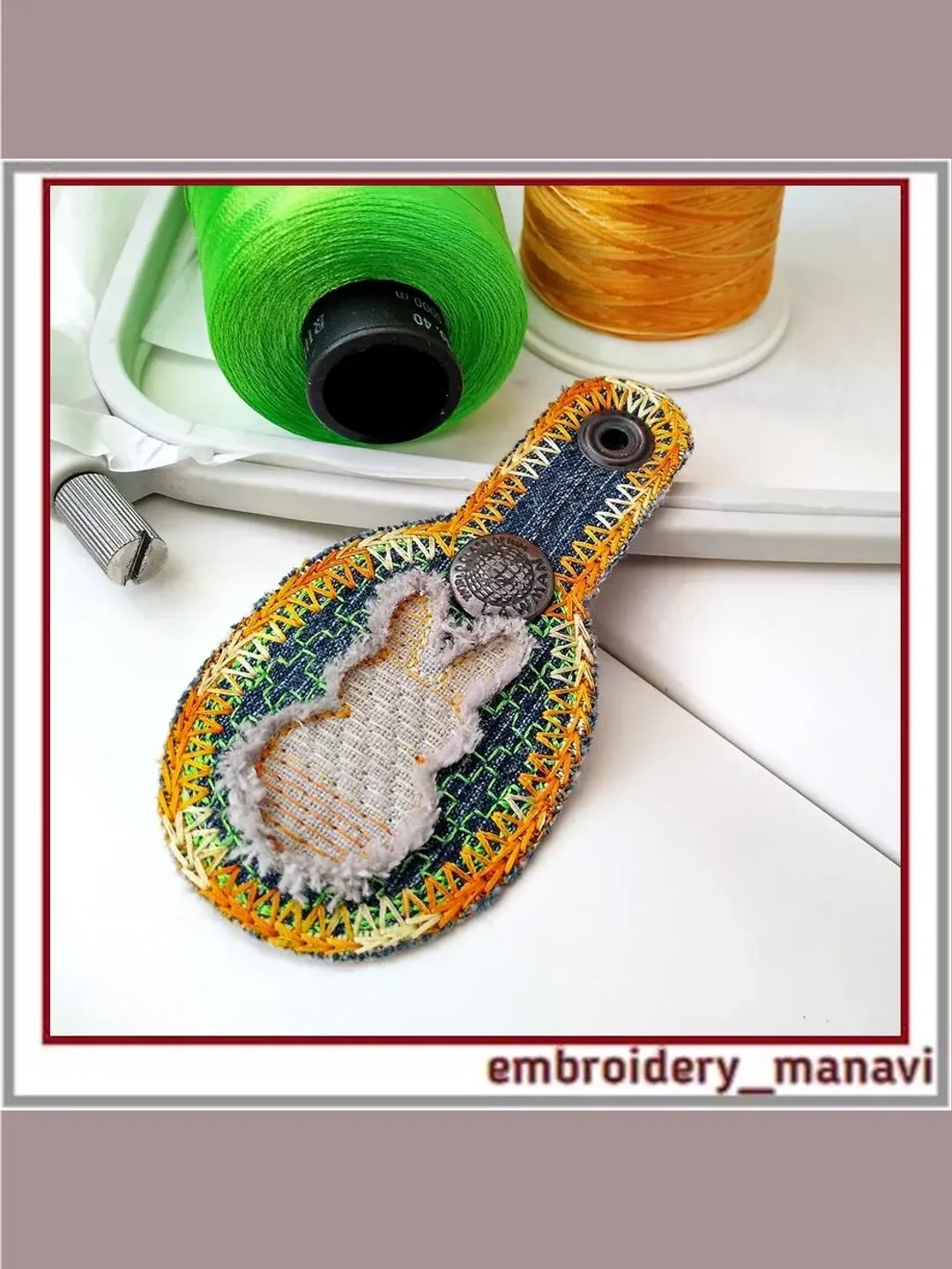 In the hoop design Cool keychain in the form of egg with a rabbit