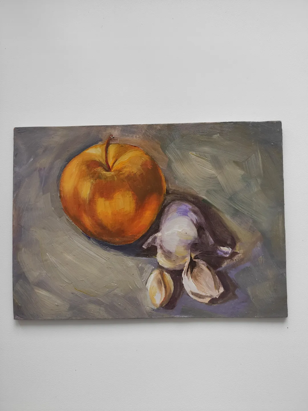 Oil painting on cardboard apple and garlic