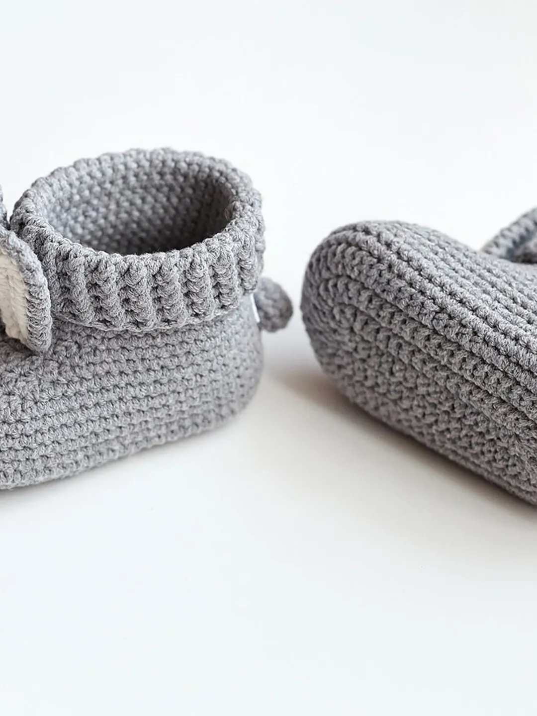 Pregnancy congrats reveal gift idea. Llama baby shower favor gift grey crochet bunny baby booties. Cute sprinkle kids present for mom to be