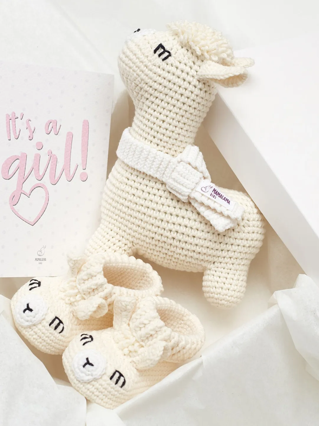 Baby girl sprinkle shower reveal party gift box with cute crochet llama toy and sweet newborn animal booties Unique pregnancy present basket