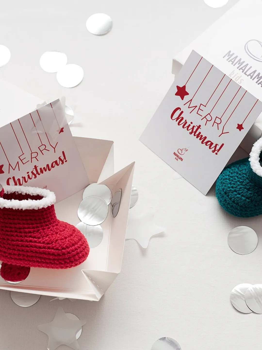 Christmas small favors gift boxes for everyone with cute crochet bootie keychain trinket. Red or green pregnancy christmas congrats
