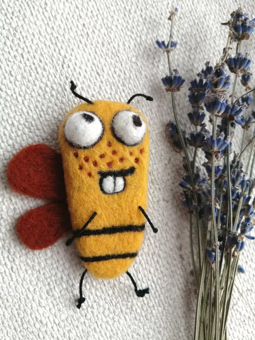 Funny mustard Bee brooch with canopies for a red-haired girl with freckles