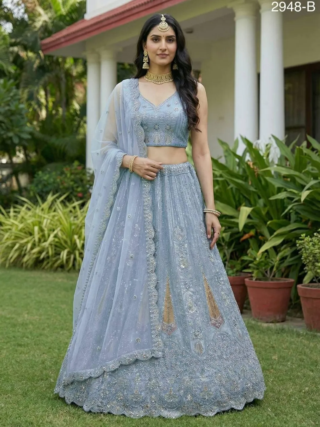 blue indian bridal dress Sky Blue Bridal Net Lehenga Heavy Dori Work, Thread Embroidery, Sequins &Zari Diamond Detailing Indian Bridal Wedding Reception Outfit