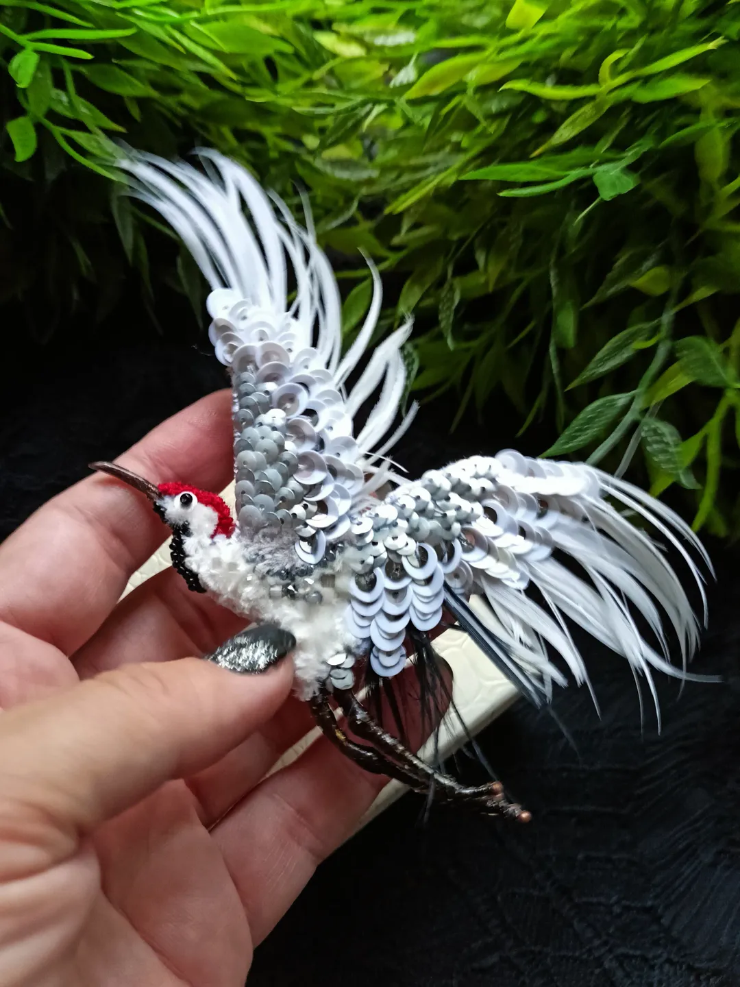 Brooch-pin in the form of birds Cranes. A beaded brooch