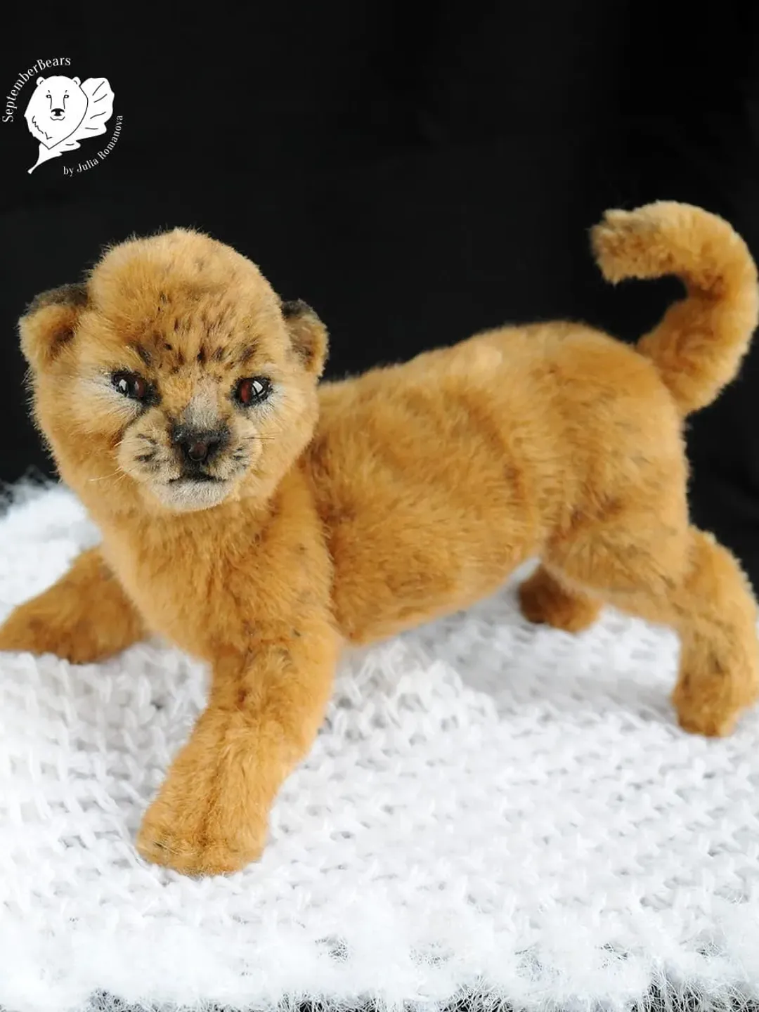 realistic toy lion cub