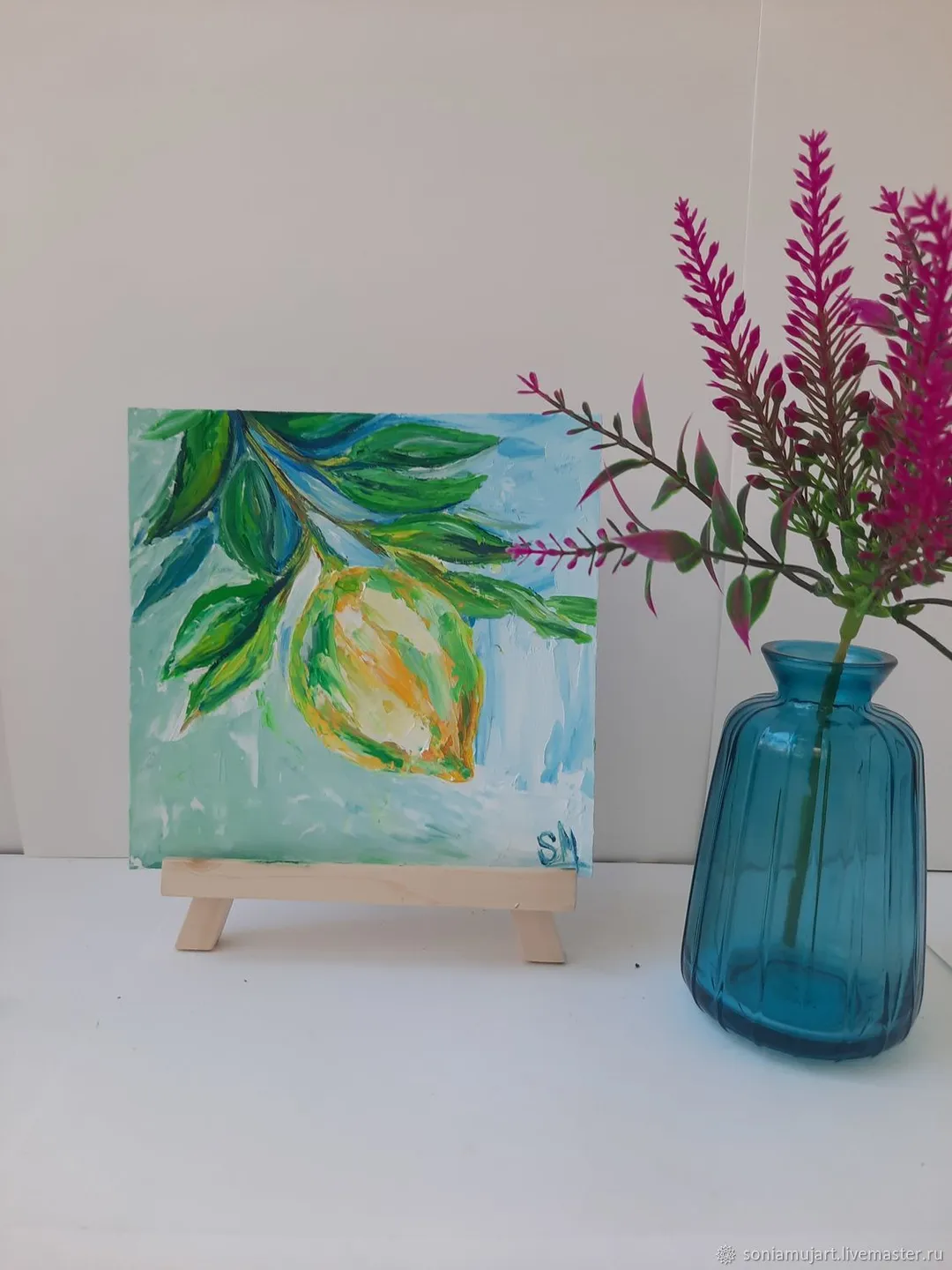 Juicy lemon on a branch. Oil