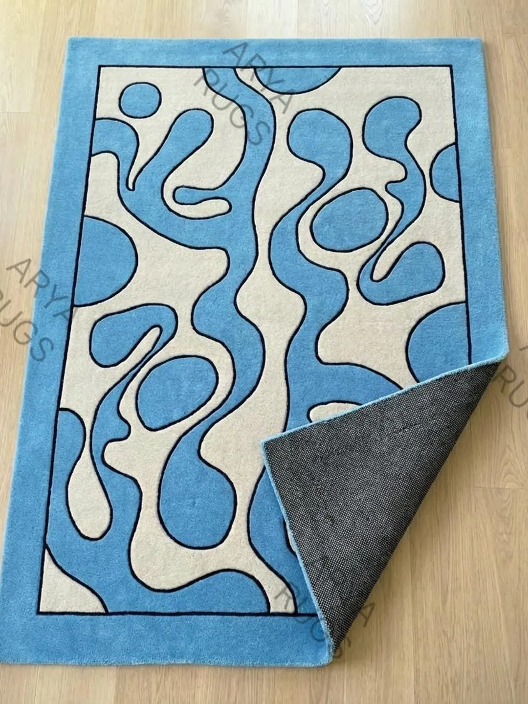 Modern Sky Blue and Cream Abstract Wavy Hand Tufted Area Rug with Black ...