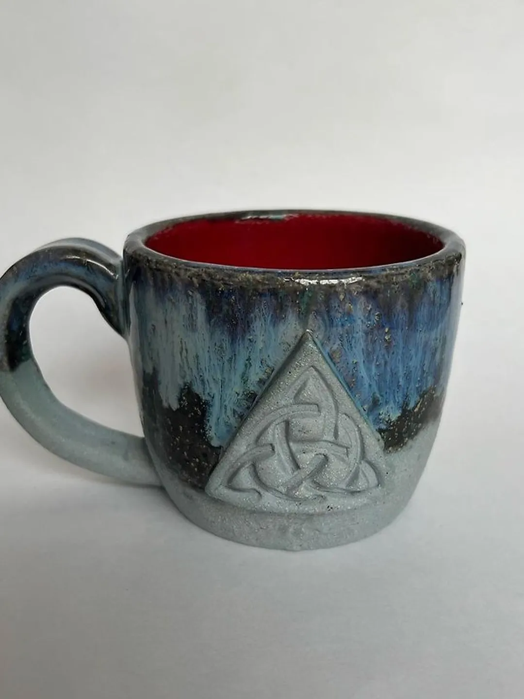Trinity knot Triquetra in circle blue clay and black galaxy glazed stoneware mug