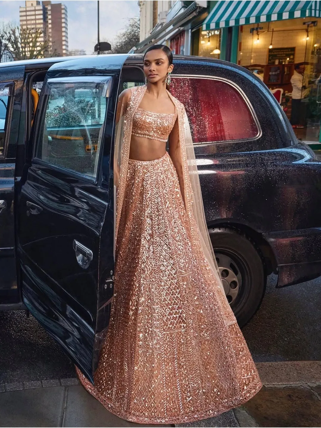 rose gold dress india  A Vision in Rose Gold by VAMA Designs  Step into pure opulence with this  breathtaking handcrafted couture lehenga, drenched in antique gold shimmer  and intricate hand-embroidered detailing. The sheer embellished