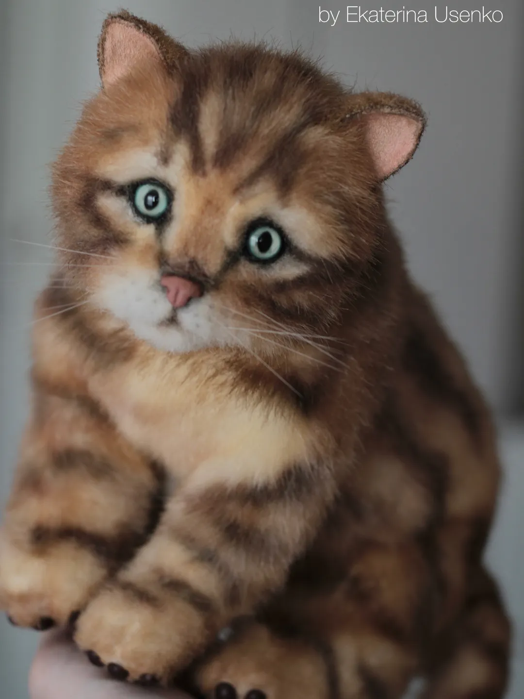 Realistic toy Kitten