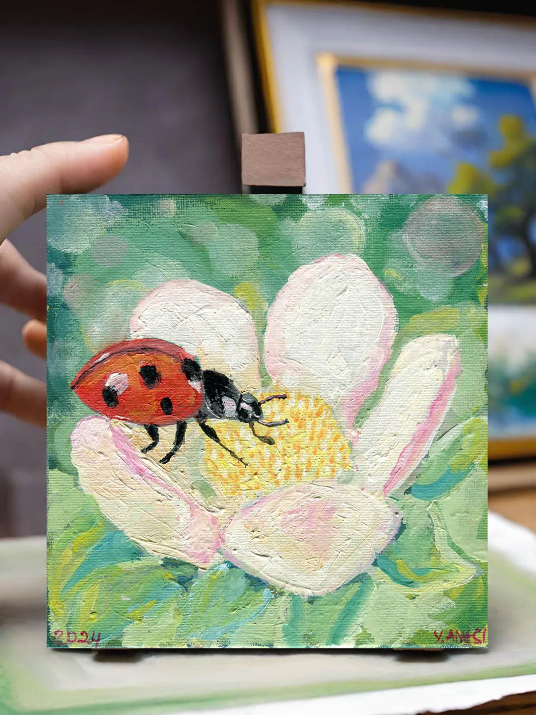 Painting flowers with a Ladybug