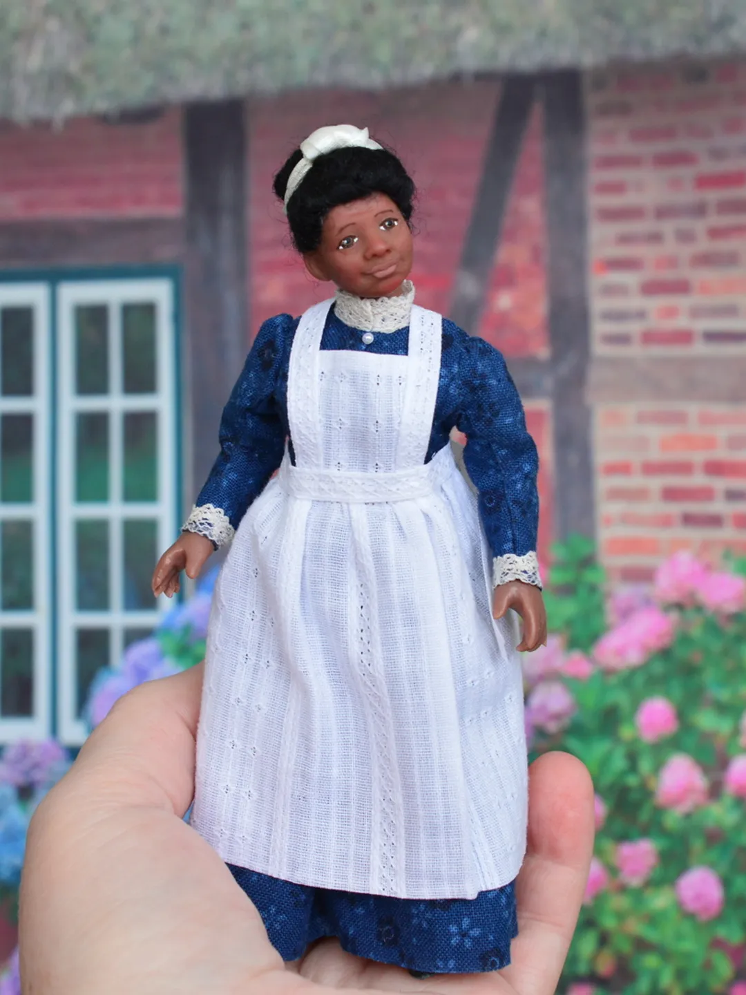 Miniature doll in 1/12 scale.  Nanny doll for the dollhouse.