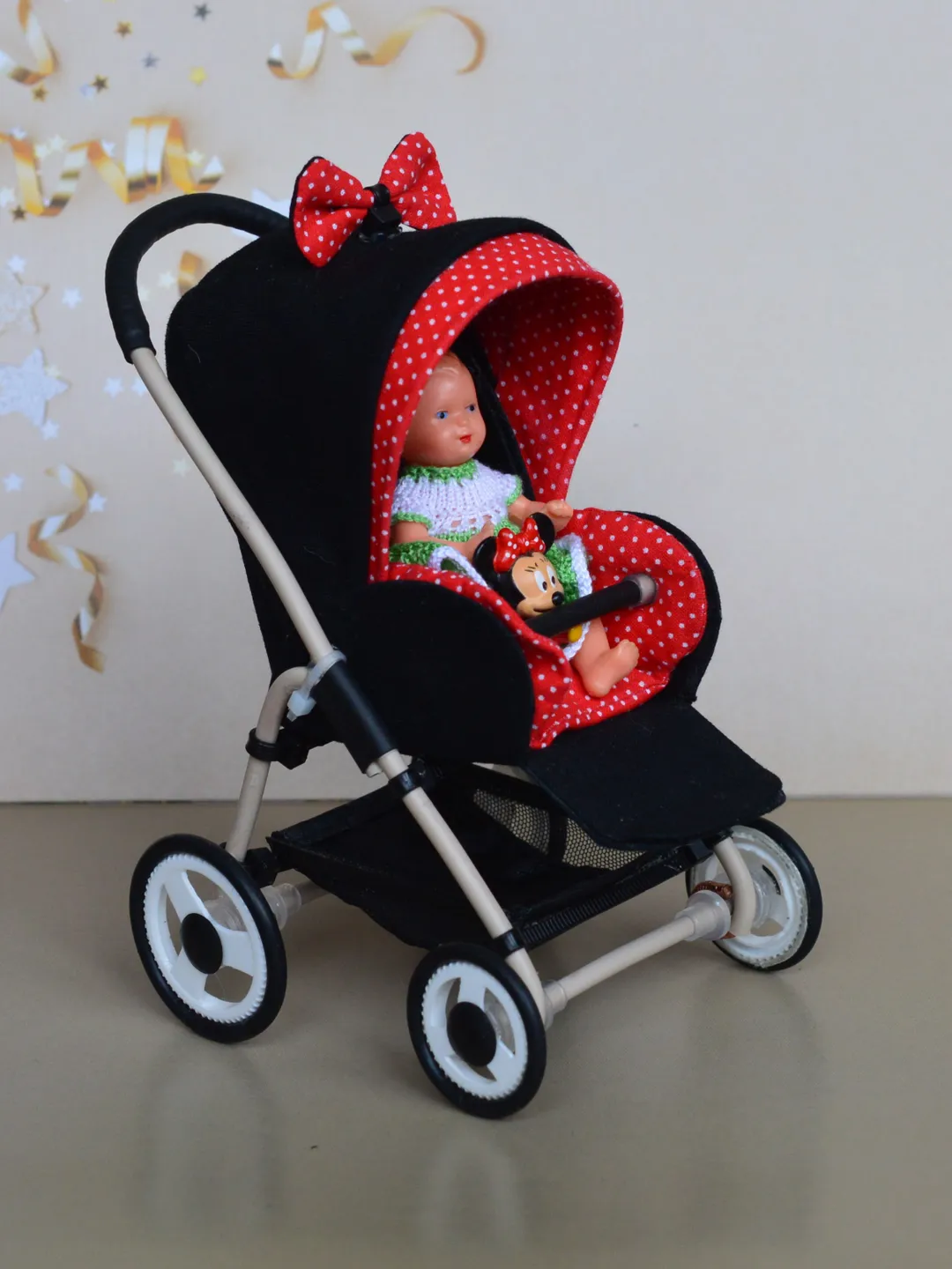 Miniature toy stroller for dolls in 1/6 scale. Accessories for small dolls and poupins. Pram for Barbie doll.